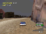 USA Raser game for PlayStation - Grand Canyon stage with big cliffs and small houses.